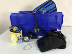 A box of scuba diving equipment including flippers, regulators, snorkels, torches,