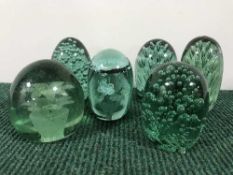 Six green glass Victorian dumps