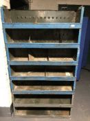 A seven section metal shelving unit