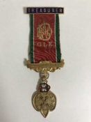 A 9ct gold and enamel lodge medal, 8.