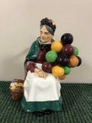 A Royal Doulton figure - The Old Balloon Seller HN 1315