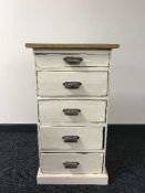 A reclaimed pine five drawer chest