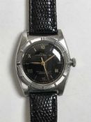 A vintage Rolex bubble back Oyster stainless steel wrist watch, numbered 458722.