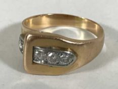 A diamond set buckle ring,