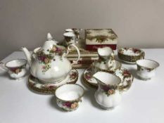 A tray of twenty seven pieces of Royal Albert Old Country Roses china