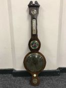 A nineteenth century mahogany banjo barometer