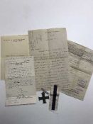 A military cross on suspension ribbon with various paperwork awarded to Captain A E Crowder,