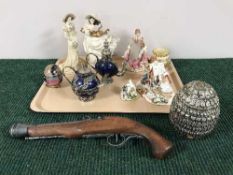 A tray of two Lillyput Lane cottages, three Leonardo collection figures, replica flint lock pistol,