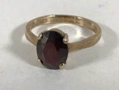 A 9ct gold garnet ring