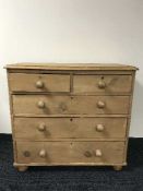 A Victorian pine five drawer chest