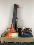 A box of Flymo garden vac, Black and Decker jigsaw, wall paper stripper,