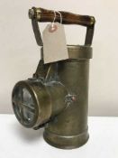 A brass Cage Inspection lamp