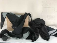 A box of wet suits,
