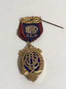 A 9ct gold and enamel medal, 'Presented to Bro George Harwood K.O.M.