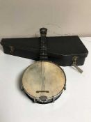 A George Formby ukulele in case bearing signature on skin