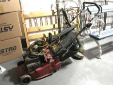 A Mountfield Quantum MX35 petrol lawn mower together with a black and Decker hedge trimmer and