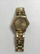 An 18ct gold lady's Ebel wristwatch, the dial set with diamond numerals, 72.