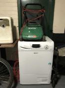 A Hotpoint condenser dryer and Qualcast mower with box