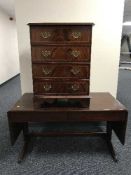 An inlaid mahogany sofa table fitted two drawers and a audio cabinet