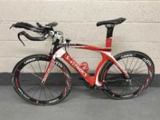 A specialised transition TT bike, medium frame size, red, black and white frame,
