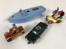 A Sutcliffe model boat with key, together with Corgi The Green Hornet's Black Beauty,