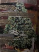 A boxed 7' Christmas tree and a bag of lights