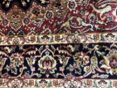 A fringed silk finished Keshan rug,