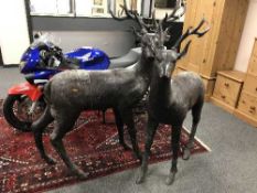 An impressive pair of bronze stag figures, height 156 cm.