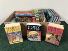 A box of books - seven volumes of Harry Potter,