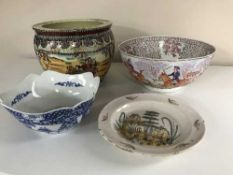 A Chinese fish bowl planter, tin glazed plate,