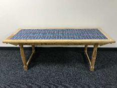 A blond oak rectangular tiled coffee table