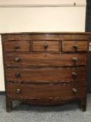 A Victorian inlaid mahogany bow fronted six drawer chest