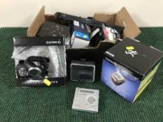 A box of Sony mini disc player, sat nav, Garmin 4 runner trainers, watches,