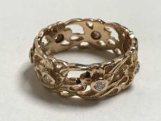 An 18ct gold eternity ring set with diamonds, 6.4g.