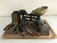 A tray of Avery scales and weights, horse shoes,