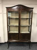 An Edwardian mahogany glazed display cabinet