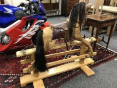 A hand crafted Victorian style rocking horse