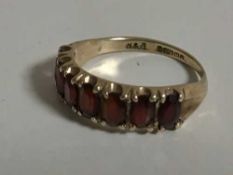 A 9ct gold garnet ring