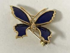 An 18ct gold diamond and enamel butterfly brooch, 6.