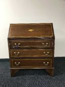 An Edwardian inlaid mahogany writing bureau