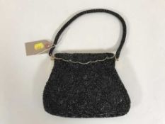 An early/mid twentieth century black beaded evening bag