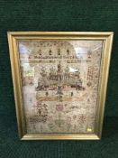 A gilt framed Regency sampler - The Dedication of the Temple by Elizabeth Nixon dated 1814