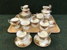 A tray of thirty-one pieces of Royal Albert Old Country Roses china