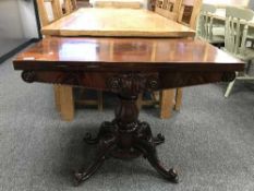 A Victorian mahogany tea table
