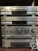 An inlaid mahogany hifi cabinet containing Sony seperates and speakers