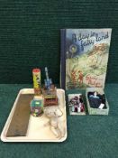 A tray of keliedoscope, rubix cube, wooden cribbage board,