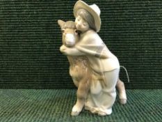 A Lladro figure - Boy with donkey