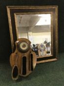 A contemporary framed mirror together with an oak barometer brush set