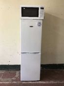An ice king fridge freezer together with a Panasonic invertor microwave