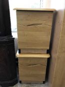 A contemporary beech effect double door wardrobe